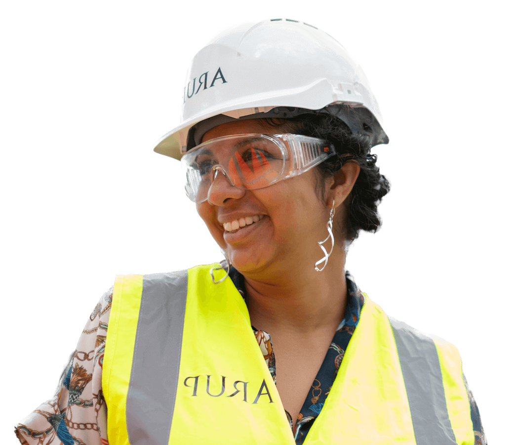 Constuction woman smiling in a hard hat