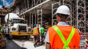 construction worker looking at a construction ssite