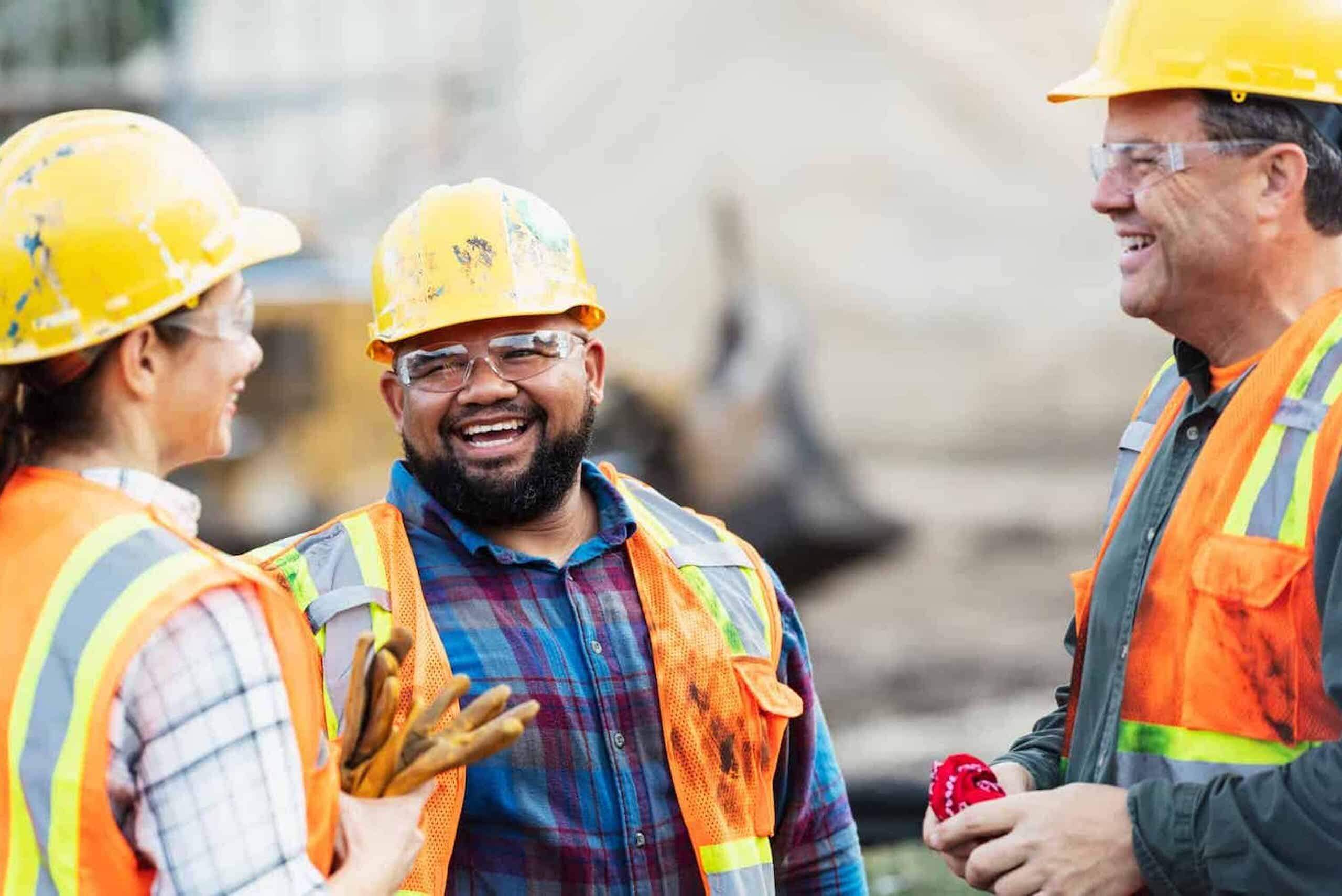 Three-happy-construction-workers-16_9