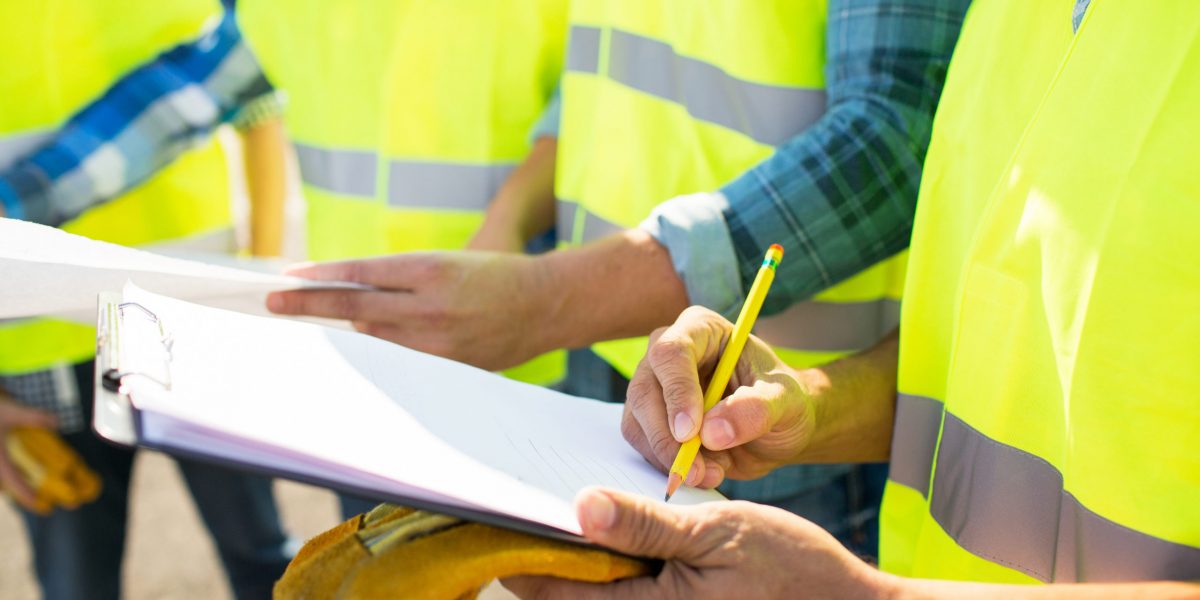 Industry,,Building,,Paperwork,And,People,Concept,-,Close,Up,Of